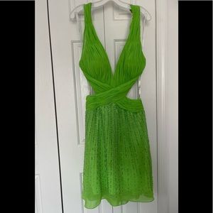 Green open back dress